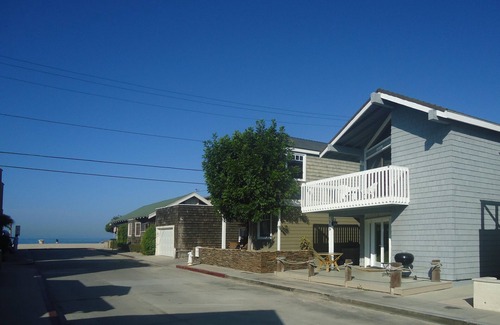West Newport House | Two doors from the sand and the Pacific Ocean.
