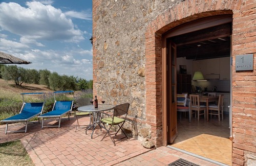 Civitella Paganico Apartment | Two-room apartment with Veranda and one bedroom near Montalcino