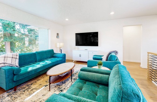 Everett House | Two-story home with spacious yard, washer/dryer & central AC- dog-friendly