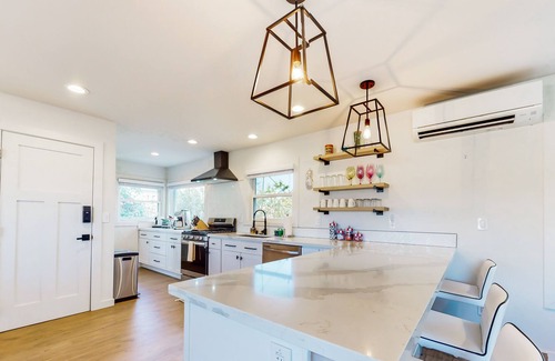 Everett House | Two-story home with spacious yard, washer/dryer & central AC- dog-friendly