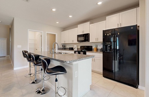 Sun City Center House | Two-story waterfront retreat with a full kitchen, central AC, & washer/dryer