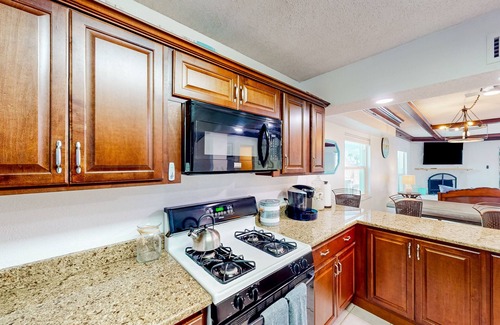 Capri Isle House | Two-story waterfront retreat with dock, pool, central AC, fireplace, & fast WiFi