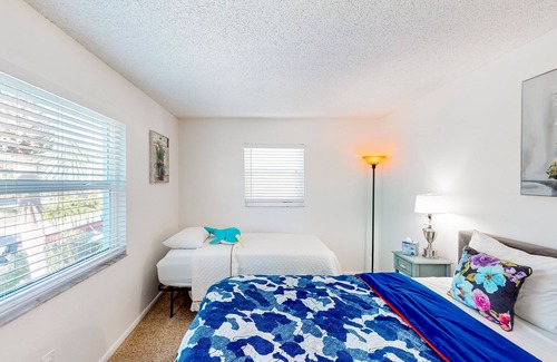 Capri Isle House | Two-story waterfront retreat with dock, pool, central AC, fireplace, & fast WiFi
