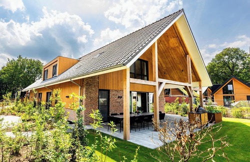 Wekerom House | Two villas, two pools – luxury spa escape for 24 guests, wheelchair accessible.