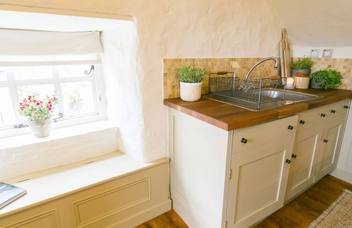 Pentraeth Cottage | Ty Fry Cottage - a cosy fire that sleeps 4 guests in 2 bedrooms