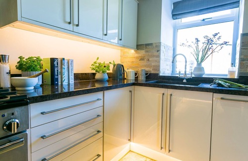 Cemaes Bay Cottage | Ty Lawr - an on the beach that sleeps 8 guests in 4 bedrooms