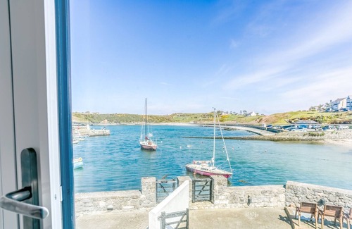 Cemaes Bay Cottage | Ty Lawr - an on the beach that sleeps 8 guests in 4 bedrooms