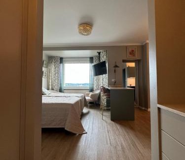 Lahti Apartment | Tyylikäs maisema-asunto asemalla