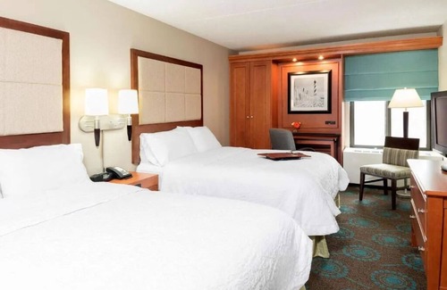 Thurston Hotel | UM Visits Made Easy: Free Hot Breakfast & Heated Pool, 3 Budget-Friendly Suites