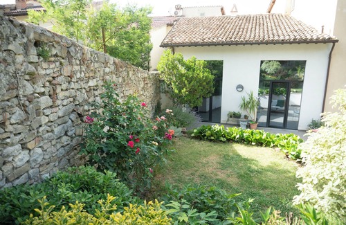 Foligno House | Umbria Hideout Villa surrounded by a green view from the garden through the hill