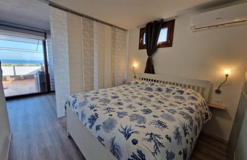 Cugnana Verde Apartment | Una finestra vista mare in Costa Smeralda