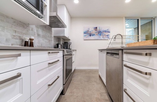 Shaughnessy Village Apartment | une retraite de qualité au niveau du jardin en centre-ville