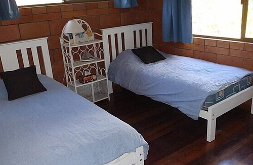 Tin Can Bay House | Unique Rustic Home amongst the tree and just a short walk to Snapper Creek