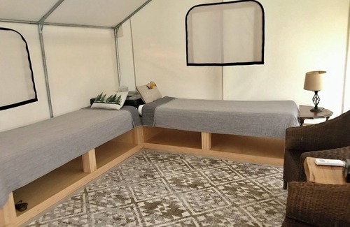 East Leroy Bed & Breakfast | Unique treehouse cabin with all amenities inspired by forest ranger lookout.