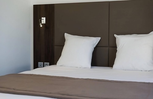 Dijon Hotel | Unwind in a Comforting Room with Nearby Tram to City | Free Offsite Parking