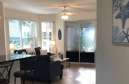 Tropical Cove Condo | Updated 3 bdrm 2 bath condo in a beautiful gated secure Golf/Tennis Community.