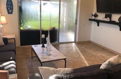 Tropical Cove Condo | Updated 3 bdrm 2 bath condo in a beautiful gated secure Golf/Tennis Community.