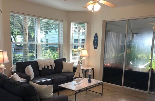 Tropical Cove Condo | Updated 3 bdrm 2 bath condo in a beautiful gated secure Golf/Tennis Community.