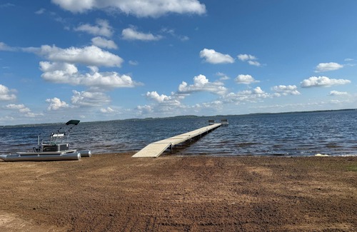 Shawano Condo | Updated 3-bedroom 2nd floor upper unit on shawano lake with pier