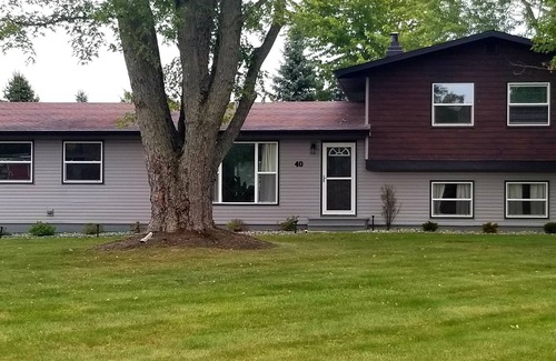 Angola House | Updated 4 Bedroom Home on 1/2 acre lot!
