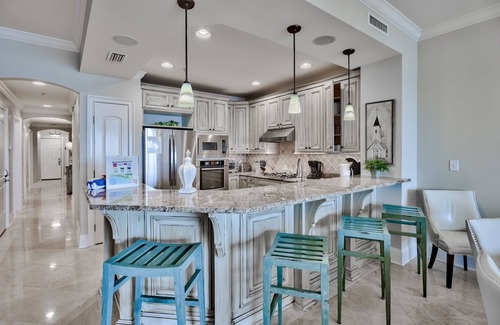 Crystal Beach Condo | Updated beach front, heated pool, includes TWO sets of beach chairs/umbrellas