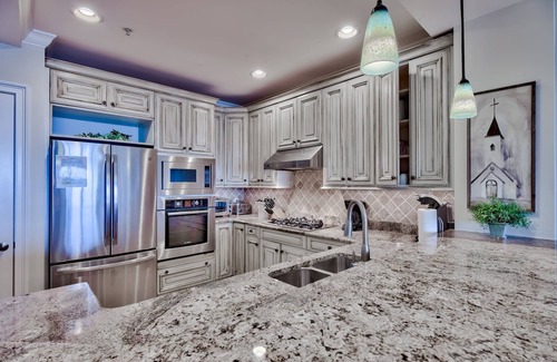 Crystal Beach Condo | Updated beach front, heated pool, includes TWO sets of beach chairs/umbrellas