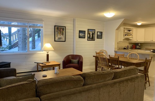 Silver Star Mountain Apartment | Updated Bright Ground Floor Suite - close to the village, backs onto chairlift