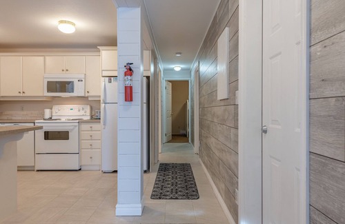 Silver Star Mountain Apartment | Updated Bright Ground Floor Suite - close to the village, backs onto chairlift