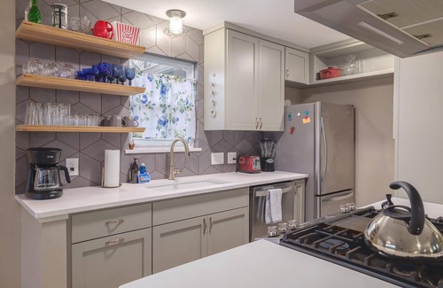 Barton Hills House | Updated duplex in Barton Hills with open kitchen, great patios. Fenced yard.