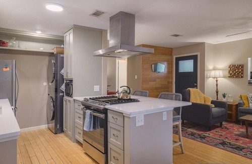 Barton Hills House | Updated duplex in Barton Hills with open kitchen, great patios. Fenced yard.