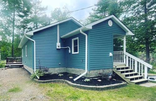 Round Lake Cottage | Updated Riverfront Cottage with Lake Access & StarLink, for Recreationalists!