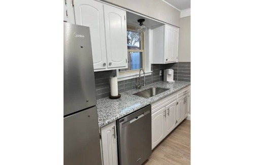 Guymon House | Updated three bedroom home across from park