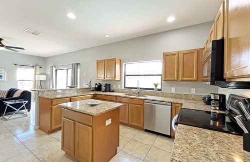 Four Corners House | Upgraded pool home with hot tub and games/movie room - gated resort 6 miles from Disney!