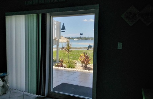 Bayview Condo | Upgraded Waterfront Condo Steps Away From Private Beach with Spectacular Sunsets
