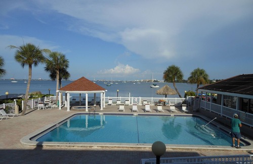 Bayview Condo | Upgraded Waterfront Condo Steps Away From Private Beach with Spectacular Sunsets