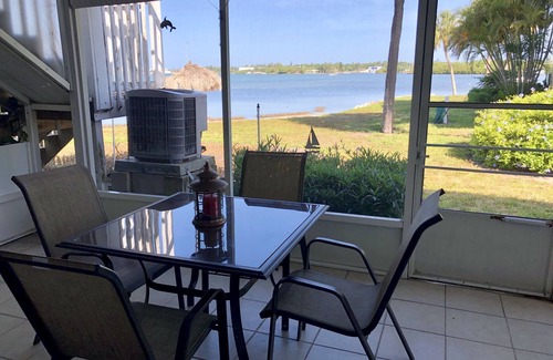 Bayview Condo | Upgraded Waterfront Condo Steps Away From Private Beach with Spectacular Sunsets