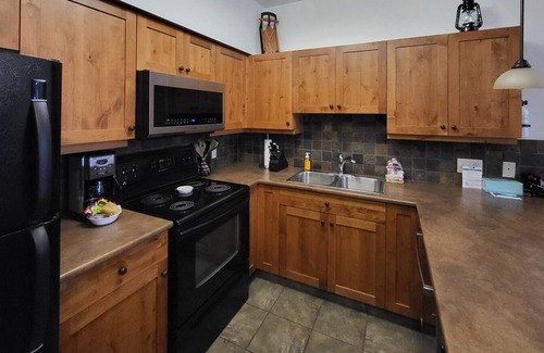 Sun Peaks Condo | Upper level entry - 2 bedroom condo with easy access to ski trails and private hot tub