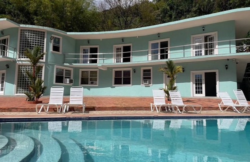 Soufriere Apartment | Upper studio 1 River backdrop