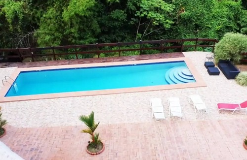 Soufriere Apartment | Upper studio 1 River backdrop