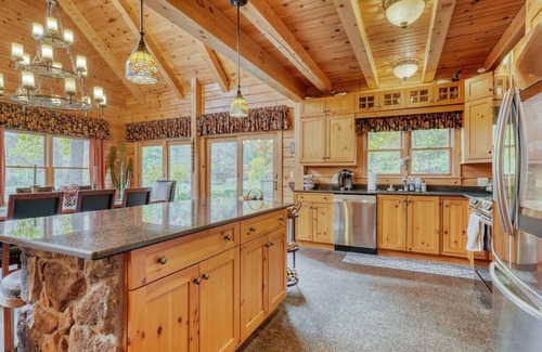 Perinton Cabin | Upscale log cabin w/20' ceilings, indoor hot tub & King beds