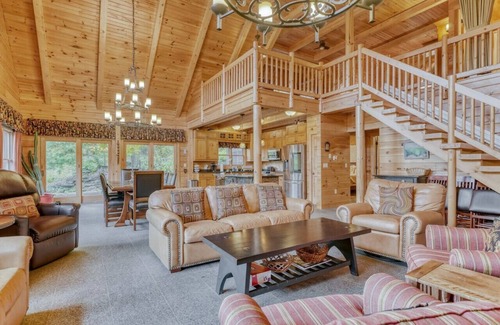 Perinton Cabin | Upscale log cabin w/20' ceilings, indoor hot tub & King beds