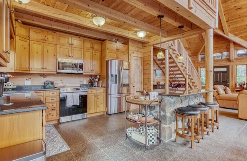 Perinton Cabin | Upscale log cabin w/20' ceilings, indoor hot tub & King beds