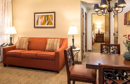 Cibola Vista Resort | UpScale Resort with Outdoor Heated Pool with a waterslide and a poolside bar, tennis court and gym