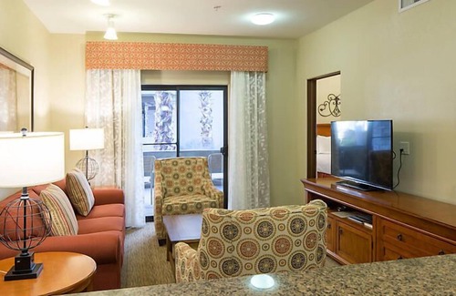 Cibola Vista Resort | UpScale Resort with Outdoor Heated Pool with a waterslide and a poolside bar, tennis court and gym