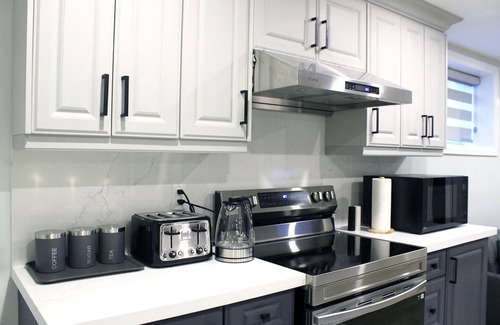 Clarington Apartment | Urban Haven: 2BR/2BA+Office, Kitchen, Dining