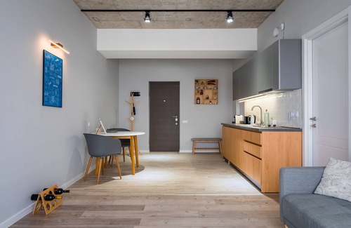 Vake Condo | Urban Loft Apt Ideal for Workcation, Couples & Families