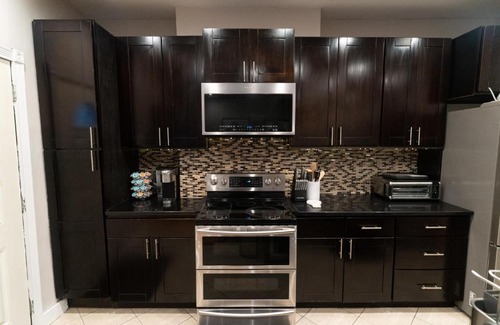 Bushwick Apartment | Urban Oasis at Cairyn's Corner with Shared Backyard