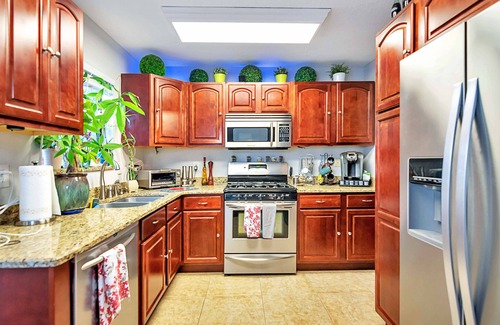 Tropic House | Urban Oasis W/hot Tub, Heated Pool And Private Movie Theater 2 Bedroom Home by RedAwning