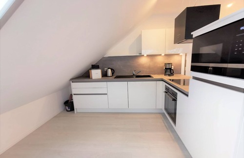 Gross Zicker Apartment | Vacation apartment with sea view and garden use - Haus Inselwind FeWo MEERsicht