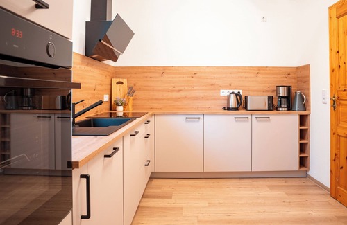 Eggeroder Brunnen Apartment | Vacation apartment Waldquelle in the old forester's lodge (Harz)